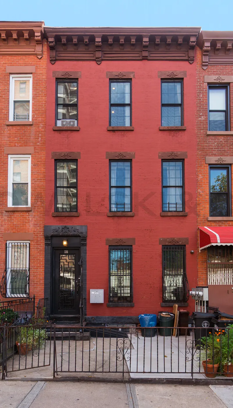 Red brick townhouse facade at 336 10th Street